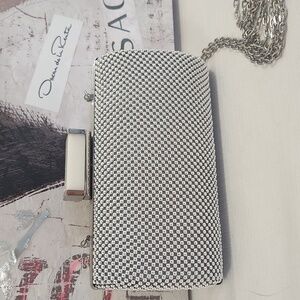 Jessica McClintock Radlee Silver Clutch Bag.